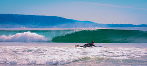 Into the Abyss Panorama: Surfer Paddling into Newport's Grand Waves Giclee / Sunset / 24x6 Tracy McCrackin Photography Wall art - Tracy McCrackin Photography