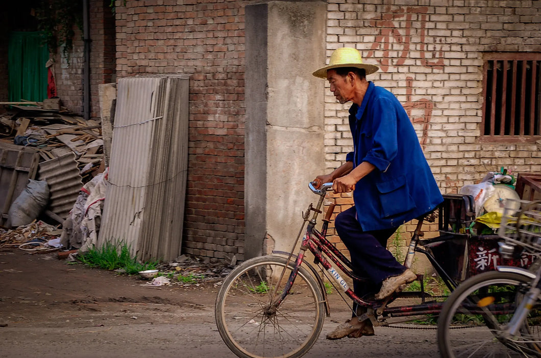 Journey Through Poverty: Solitary Cyclist in a Chinese Neighborhood Giclee / Colored / 5 x 7 Tracy McCrackin Photography - Tracy McCrackin Photography