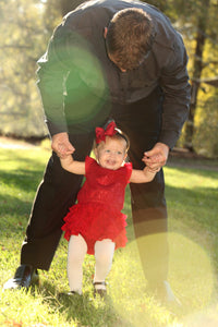 child-swinging-with-father-red-dress Giclee / Colored / 5 x 7 Tracy McCrackin Photography - Tracy McCrackin Photography